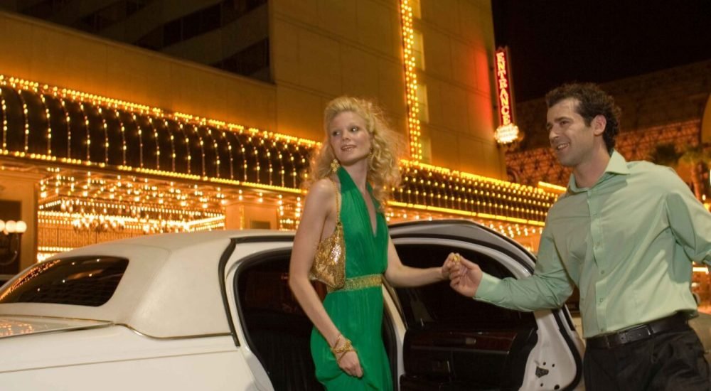 elegant-woman-and-man-with-limousine-at-night-2026-03-26-09-34-29-utc_11zon